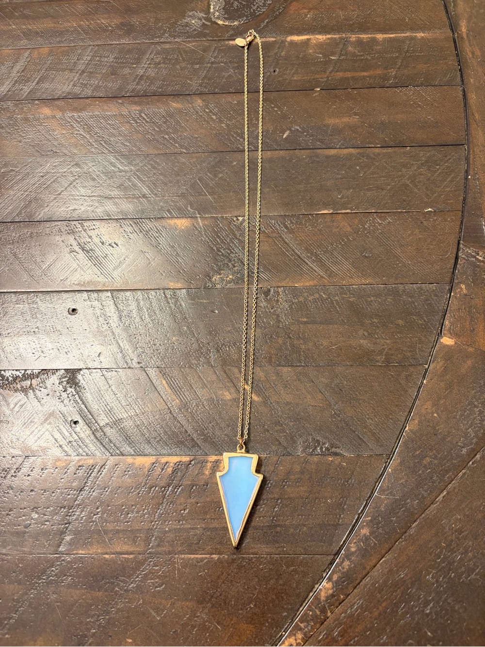 Gold-Tone Necklace with Light Blue Arrowhead Pendant